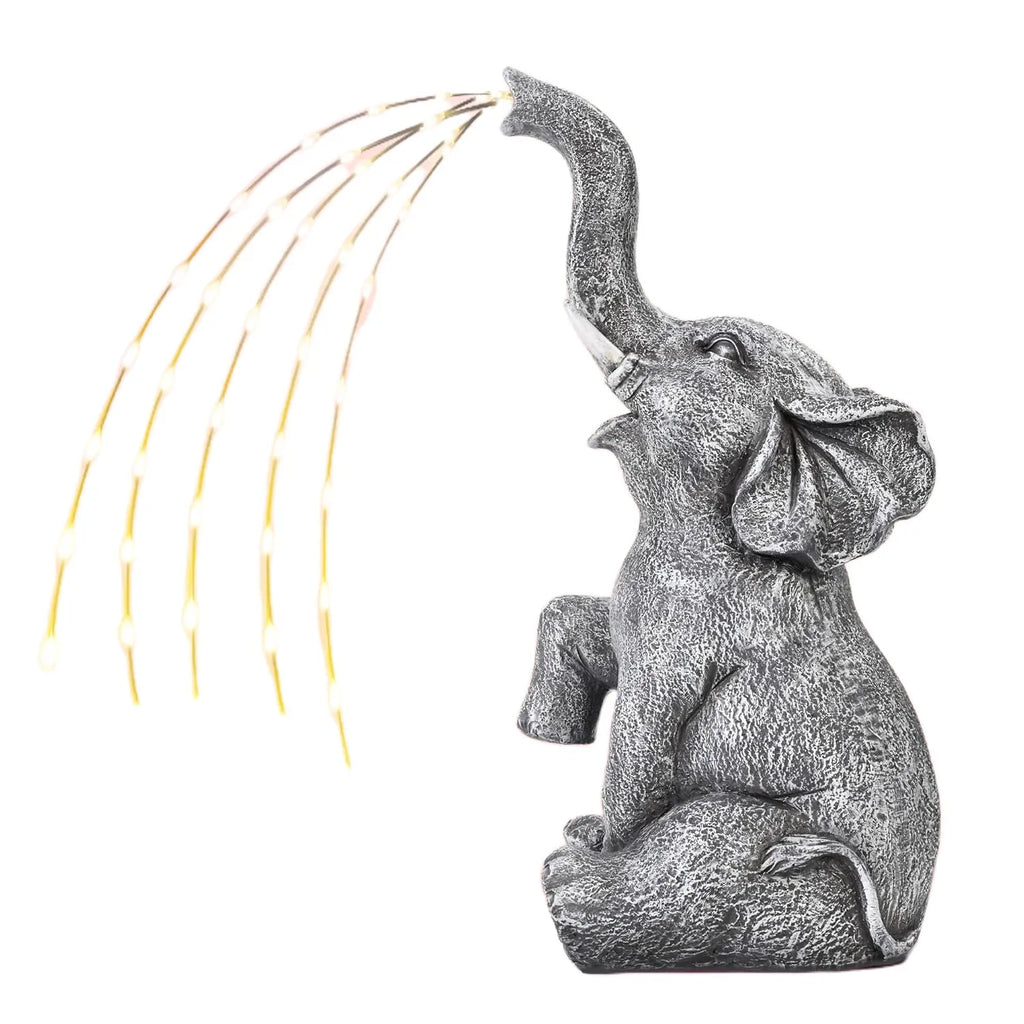 Outdoor garden elephant sculpture made from resin with integrated LED light strip for nighttime illumination