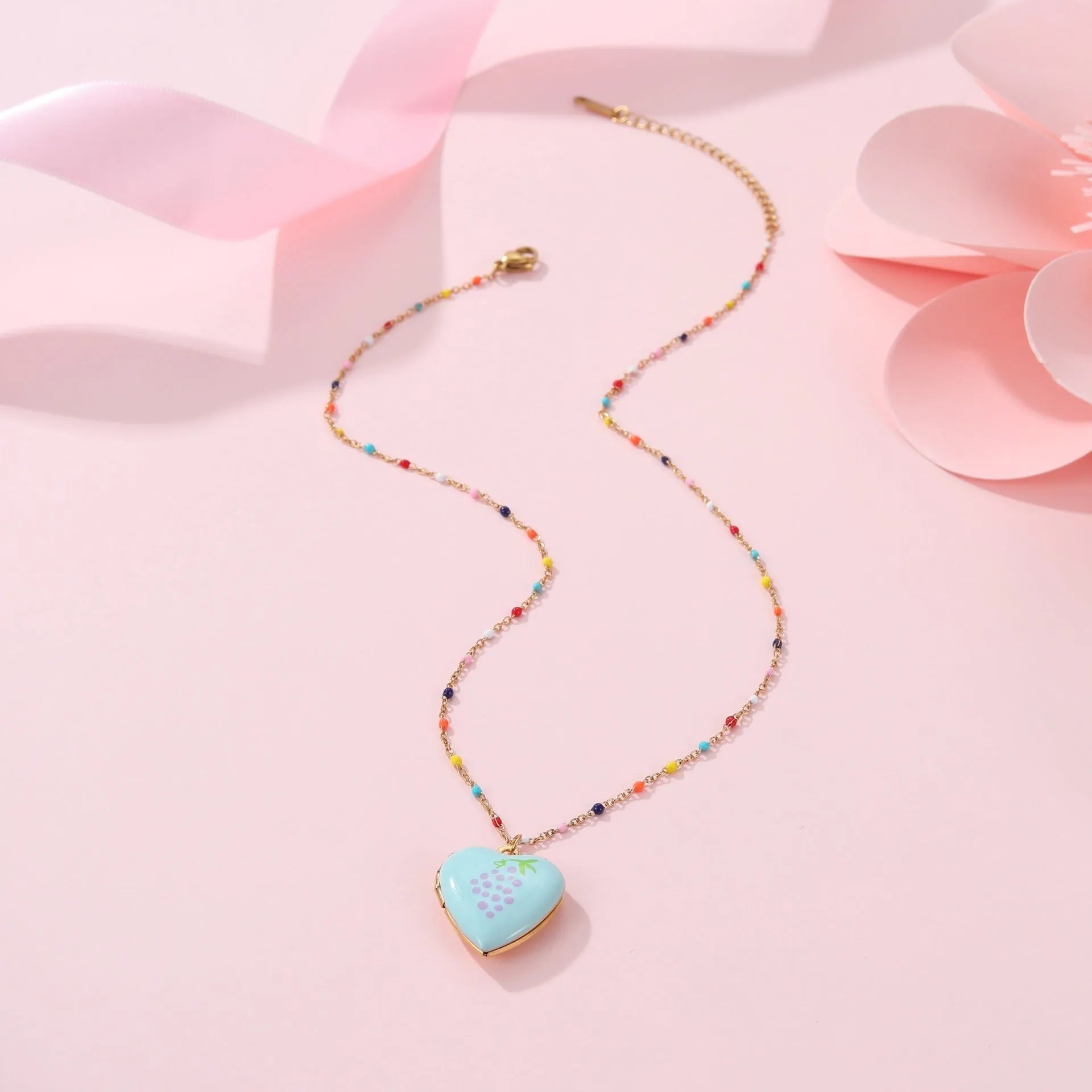 Gold-plated stainless steel necklace with fruit-shaped pendant on adjustable chain