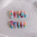 Handmade small flower and butterfly nail art sculptures for three-dimensional manicures