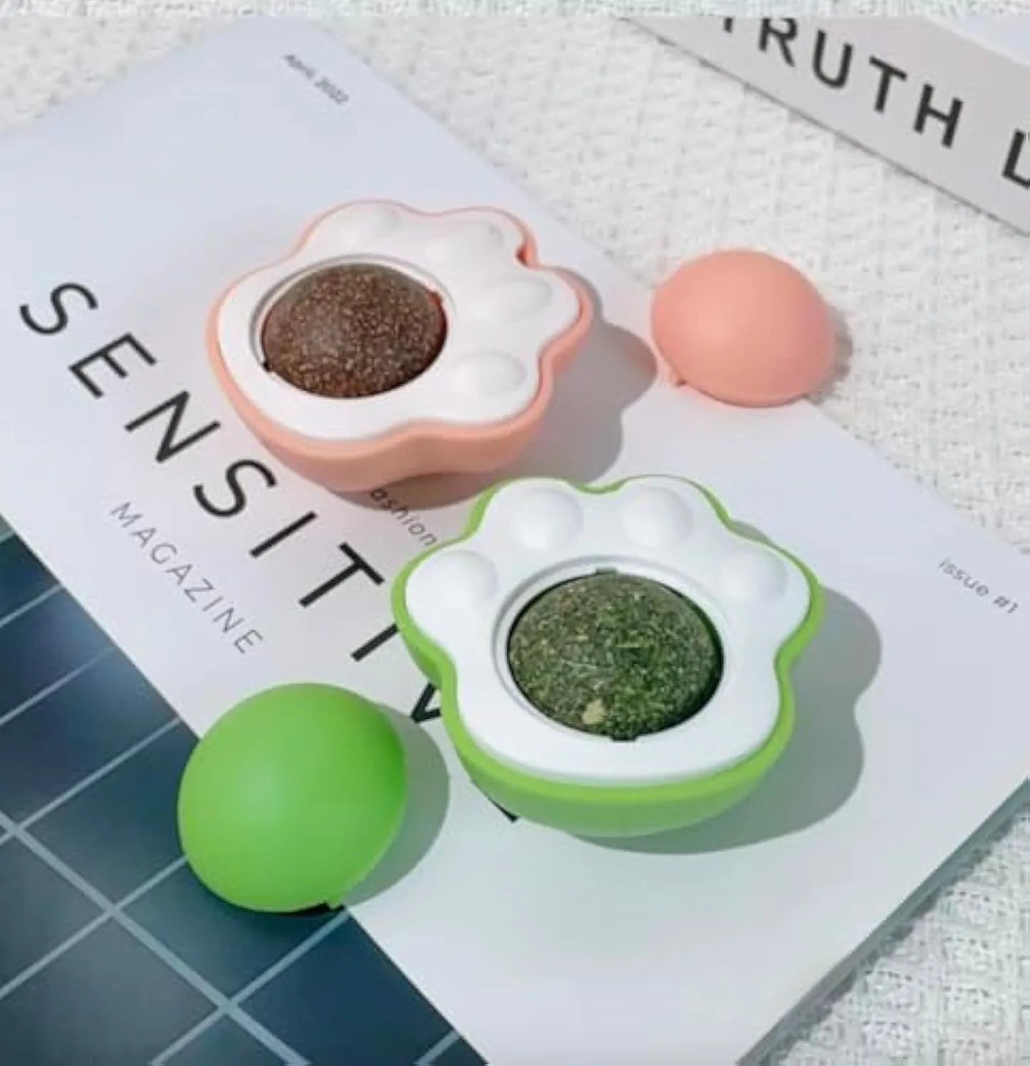 Plush catnip balls for cats in blue, green, and pink colours for interactive play and dental health