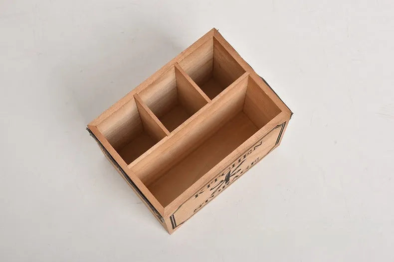 Wooden kitchen storage box for knives, forks, and chopsticks with internal dividers.