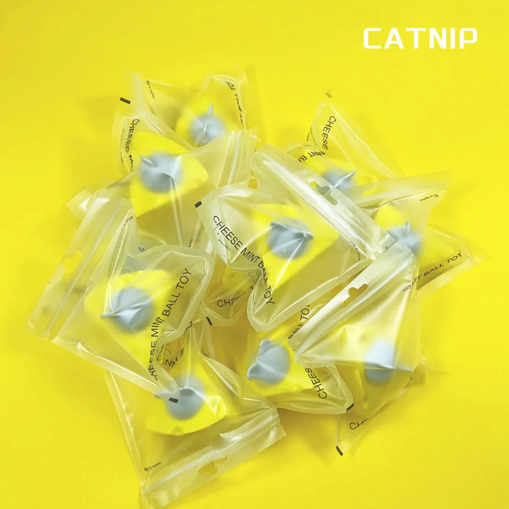 Yellow catnip toy ball with silvervine and a natural cheese flavour, includes a cat stick and wall treat holder.
