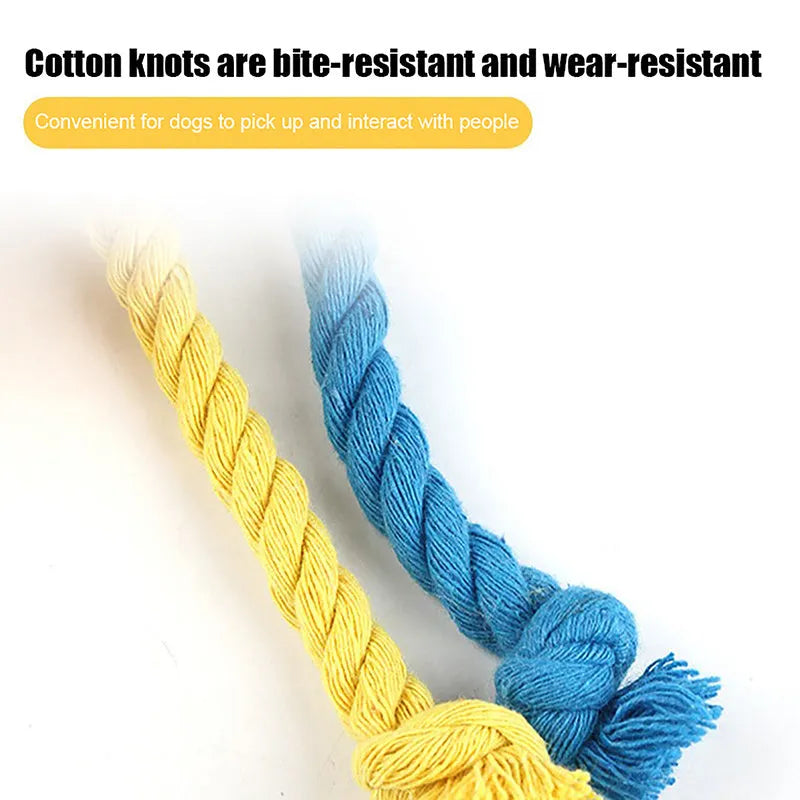 Blue and yellow elastic football dog toy with cotton rope construction for teeth grinding and interactive play