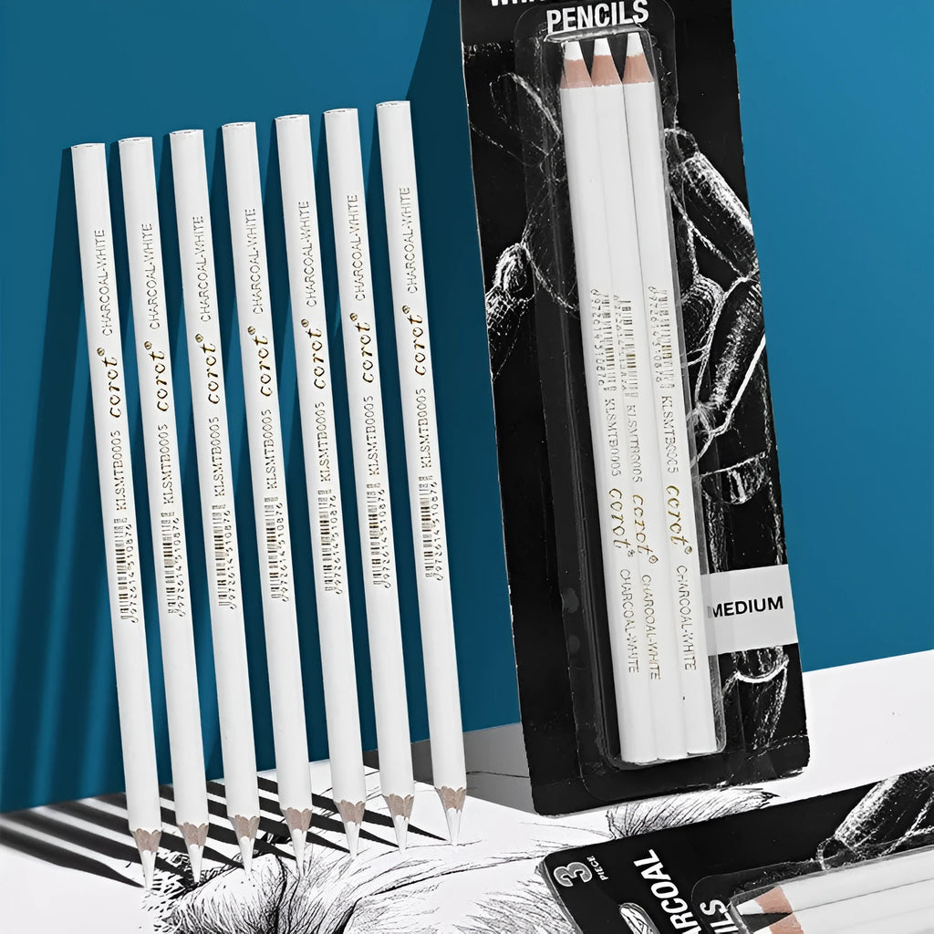 Set of three white charcoal pencils with wooden barrels for highlighting and sketching