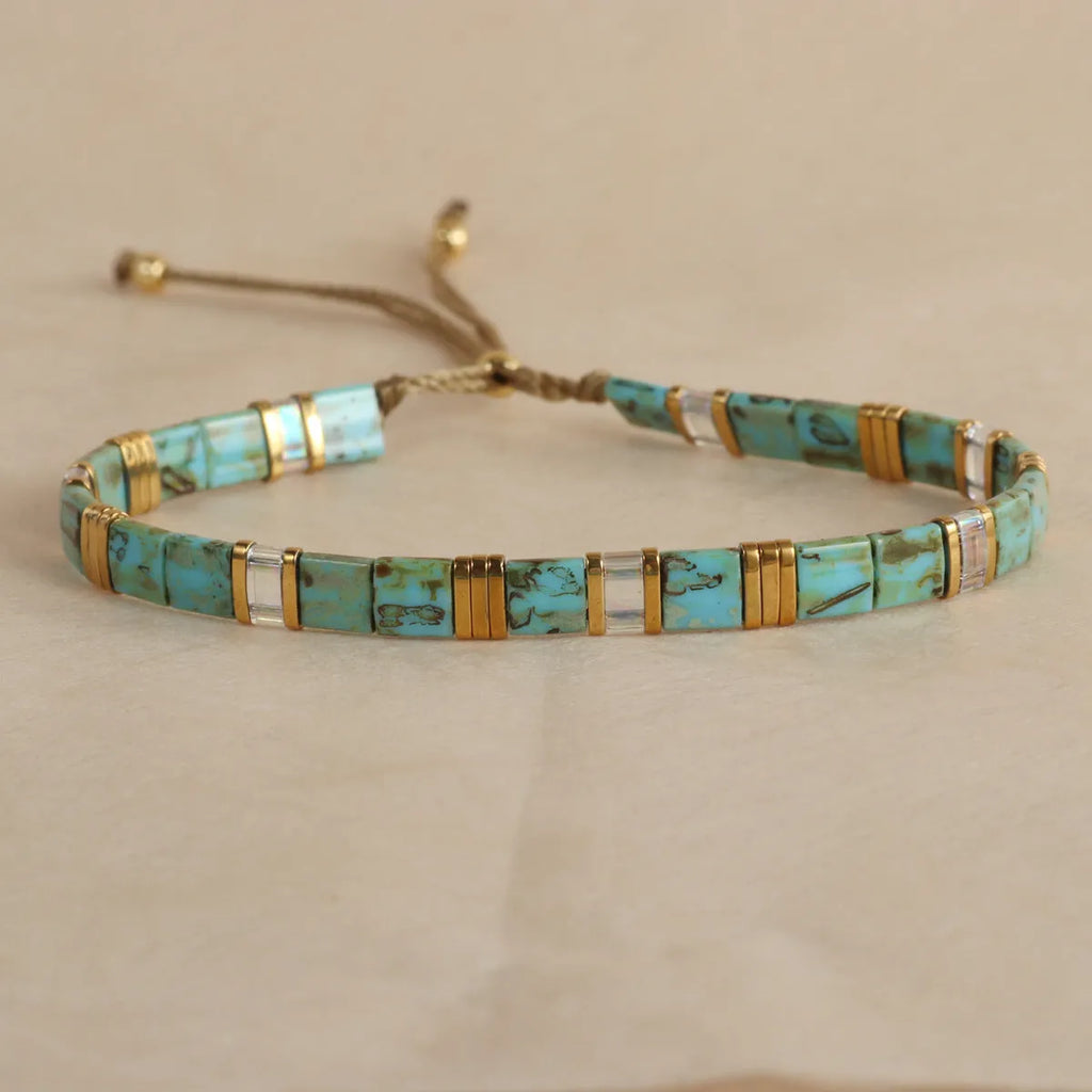 Geometric glass bead bracelet with pull bead closure in five colour options