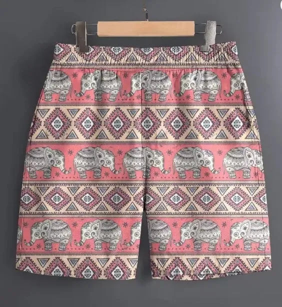Men's casual polyester shorts in a camouflage pattern, shown in a relaxed outdoor setting.