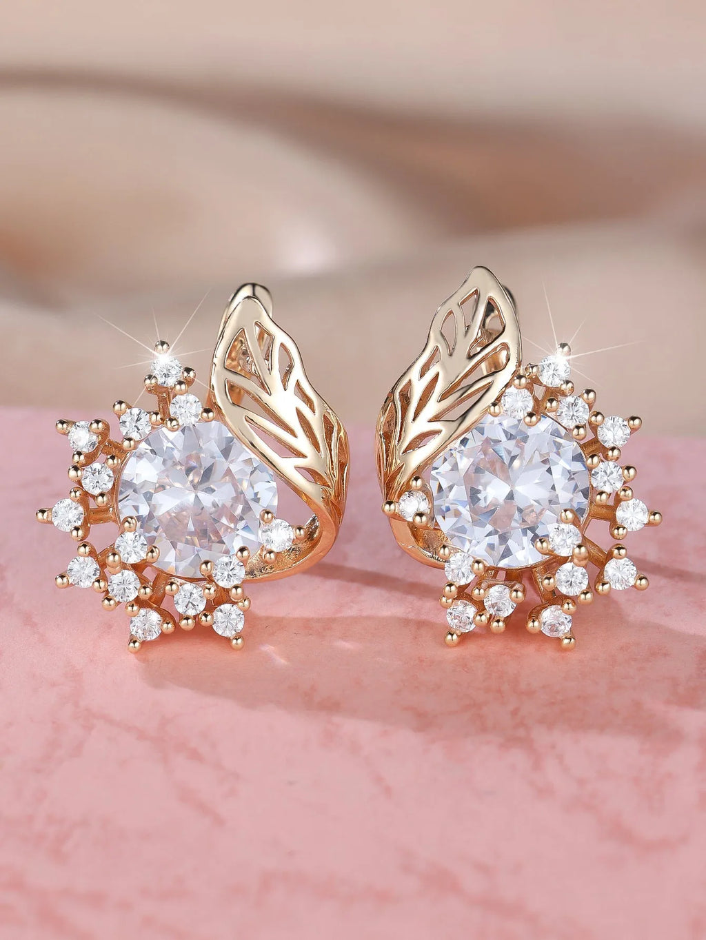 Round flower feather earrings with zircon crystals in electroplated champagne gold colour