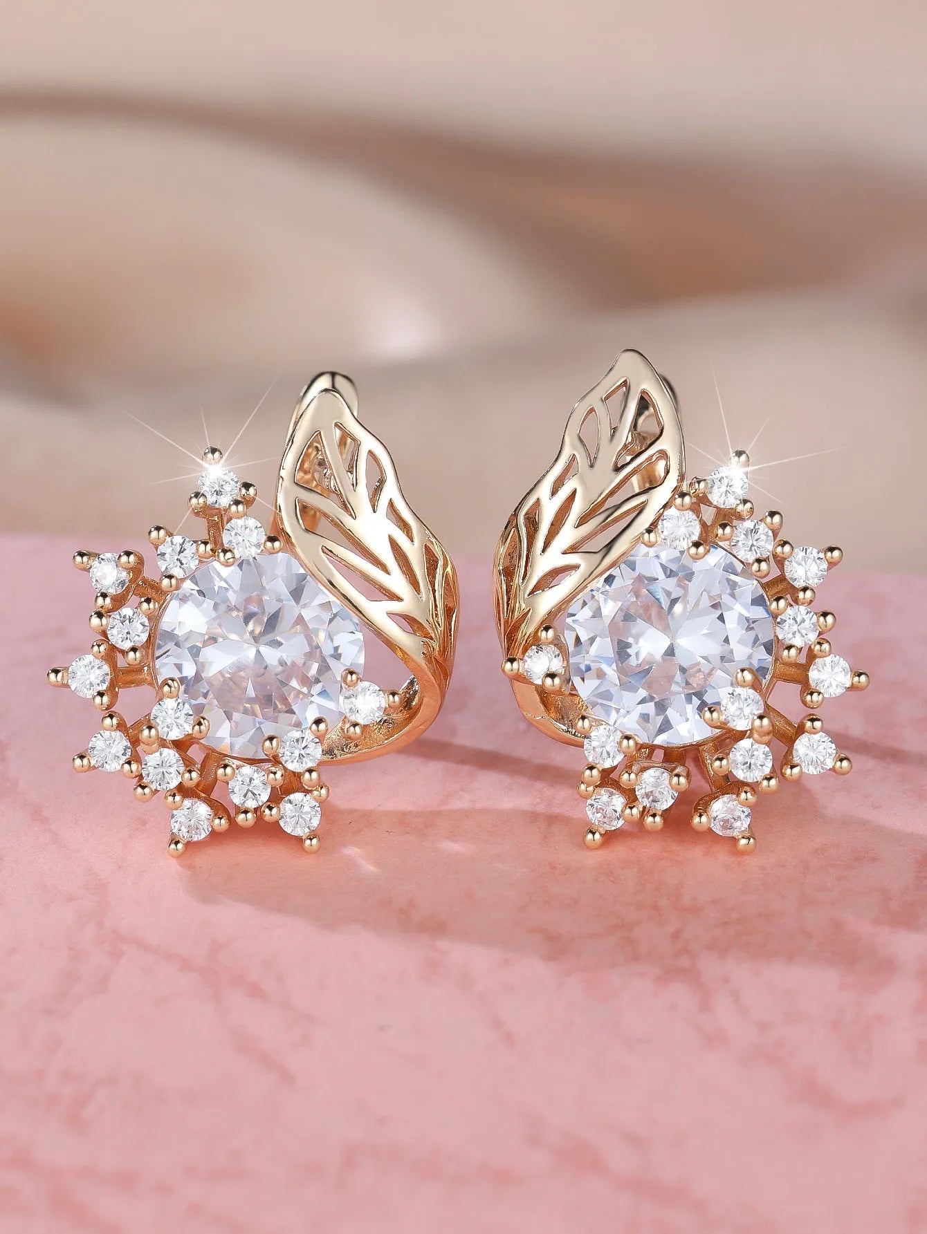 Round flower feather earrings with zircon crystals in electroplated champagne gold colour