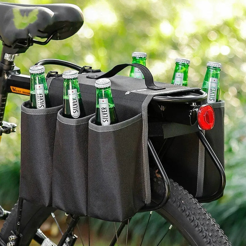 Black and orange bicycle drink bottle bag with two-sided storage compartments mounted on bike frame
