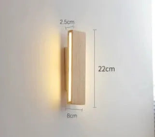 Solid wood bedroom bedside LED wall lamp in Nordic Japanese style, 22cm size, warm light wooden finish