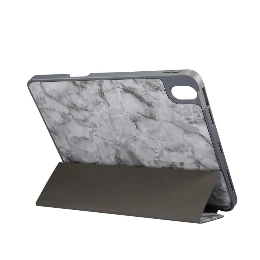 Tri-fold marbling design iPad case with pen slot in multiple colour options showing plane housing position