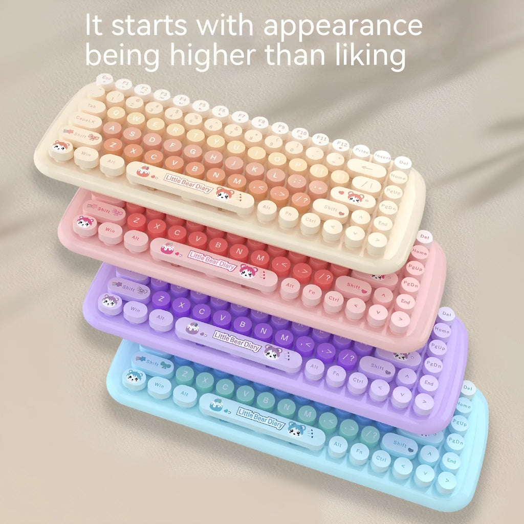 Pink mini wireless keyboard and mouse set with compact design and cartoon aesthetic