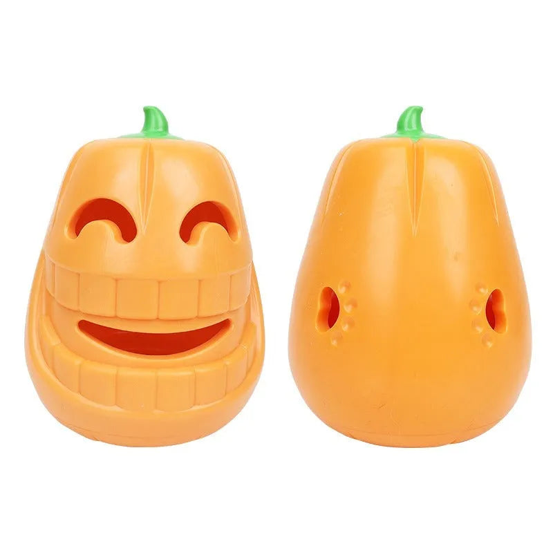 Orange Halloween pumpkin shaped dog chew toy made of durable rubber with a treat-dispensing funnel.