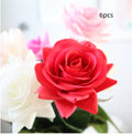 Artificial silk rose flower with red petals and green plastic stem measuring approximately 42cm long
