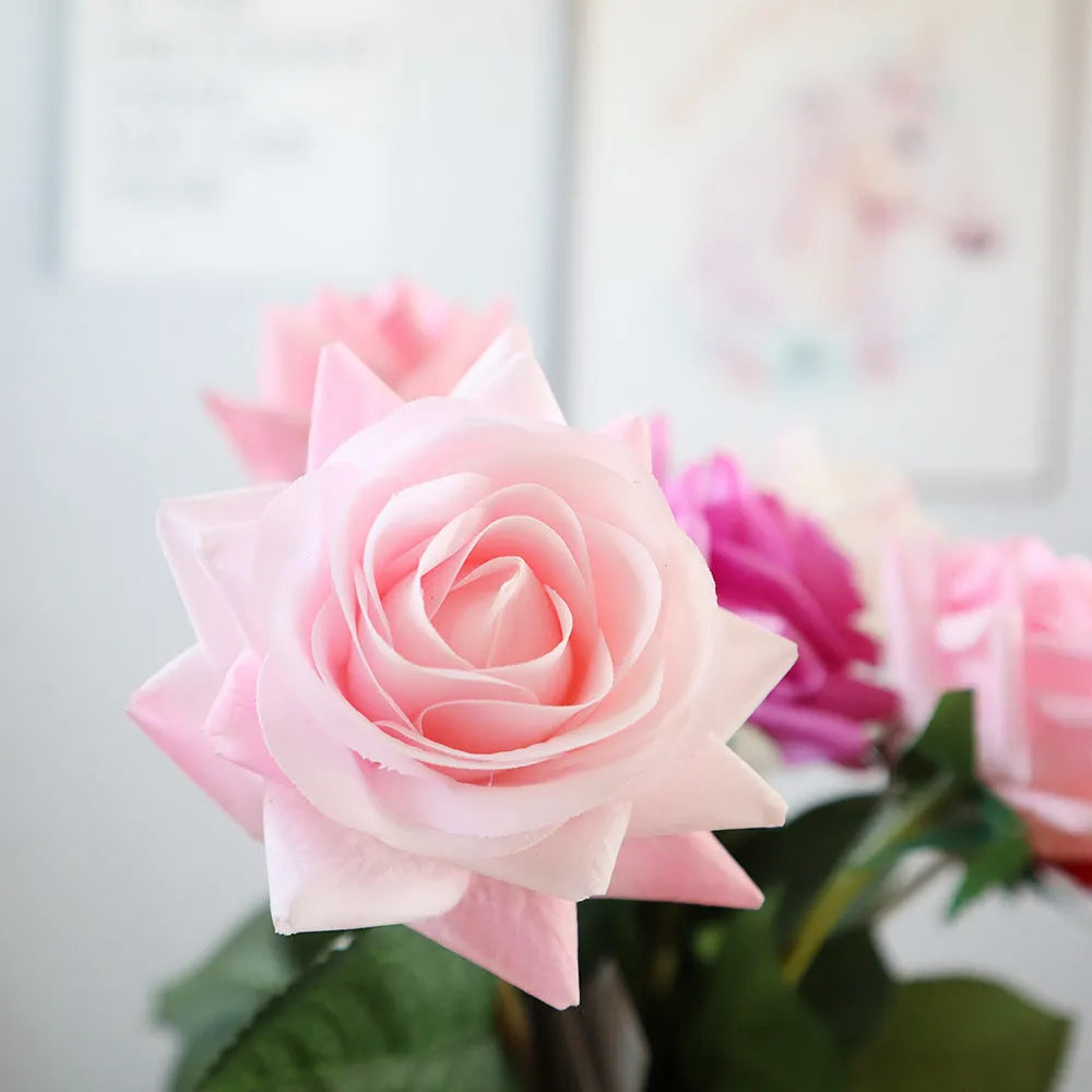 Artificial silk rose flower with red petals and green plastic stem measuring approximately 42cm long