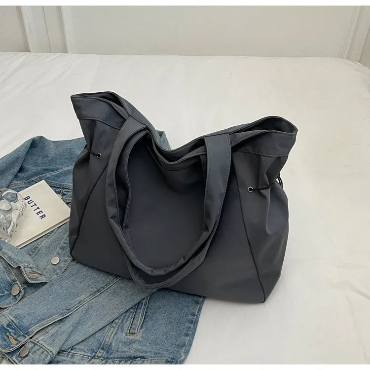 Soft Oxford cloth folding tote bag in street trend style shown in multiple colour options