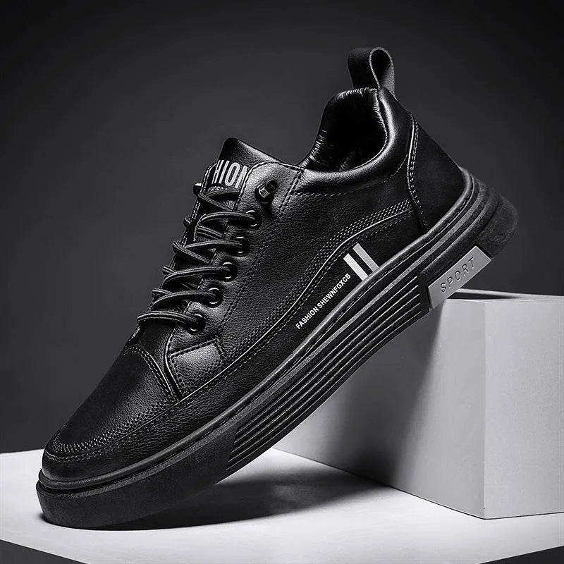Men's white and black microfiber skateboard shoes with elastic band closure and rubber sole