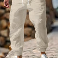 Men's straight leg cotton trousers with elastic waistband in seven colour options