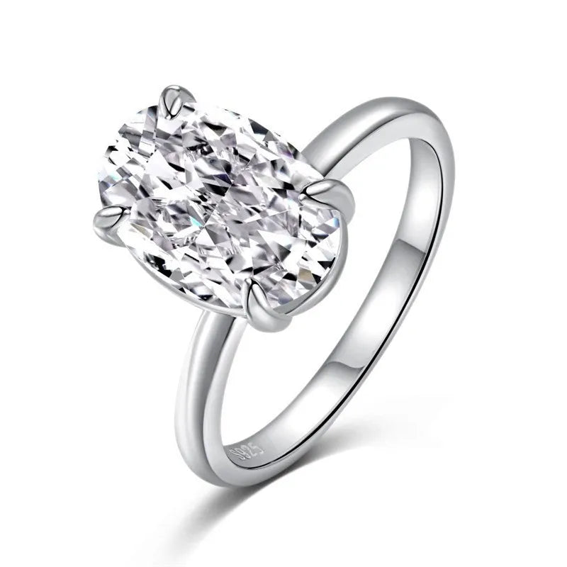 Oval gemstone ring with a four-claw setting in a choice of gold or silver colour finish.