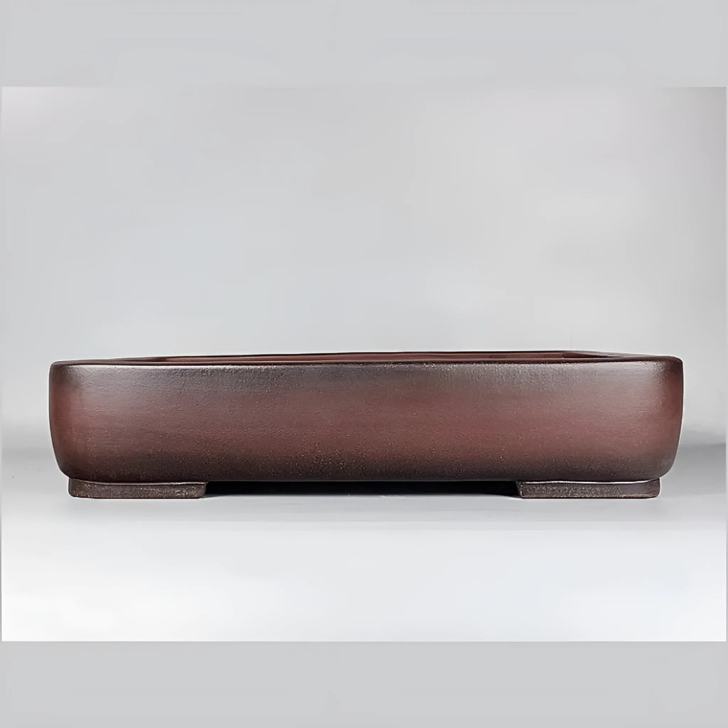 Handmade rectangular purple clay flower pot with antique finish showing natural colour variation