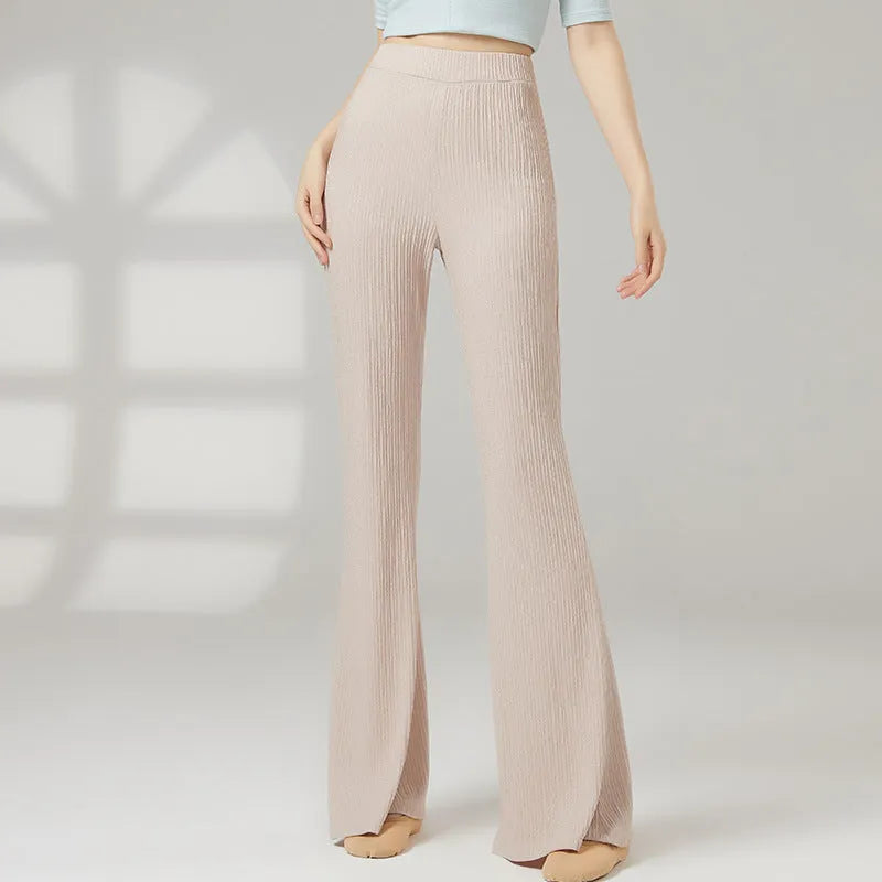 Women's solid colour stretch polyester dance practice pants for ballet and sports dance training.