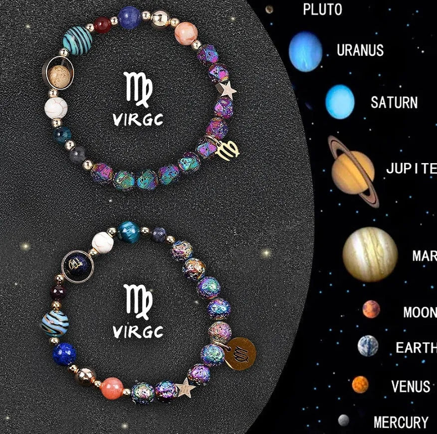 Two natural stone beaded bracelets with adjustable cords on a wooden surface, showing zodiac symbol designs.