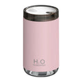 Jellyfish-shaped humidifier producing smoke ring mist with warm night light illumination