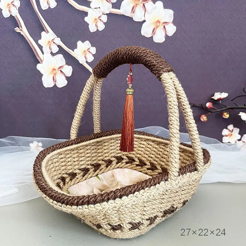 Hand-woven natural straw basket in a light brown colour, measuring 19cm by 12cm.