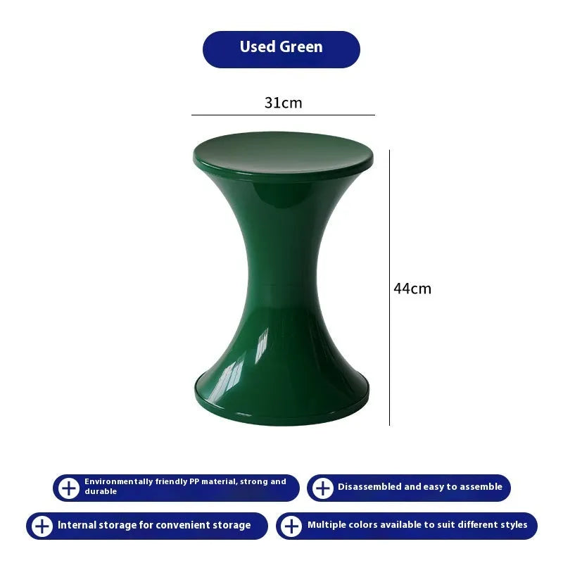Plastic shoe changing stool with hourglass design in green colour, 40cm height
