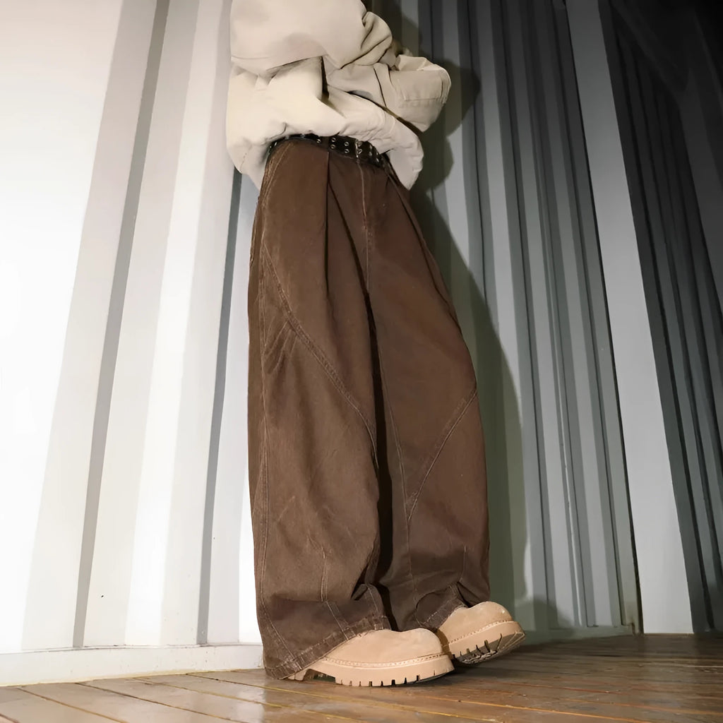 Men's loose-fit pleated trousers in a striped pattern, shown in apricot colour with a straight leg.