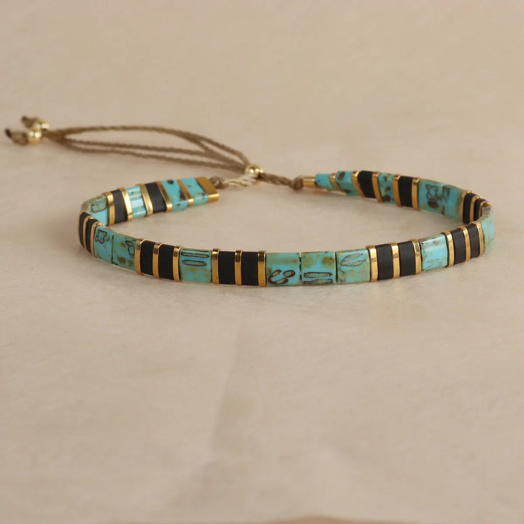 Geometric glass bead bracelet with pull bead closure in five colour options