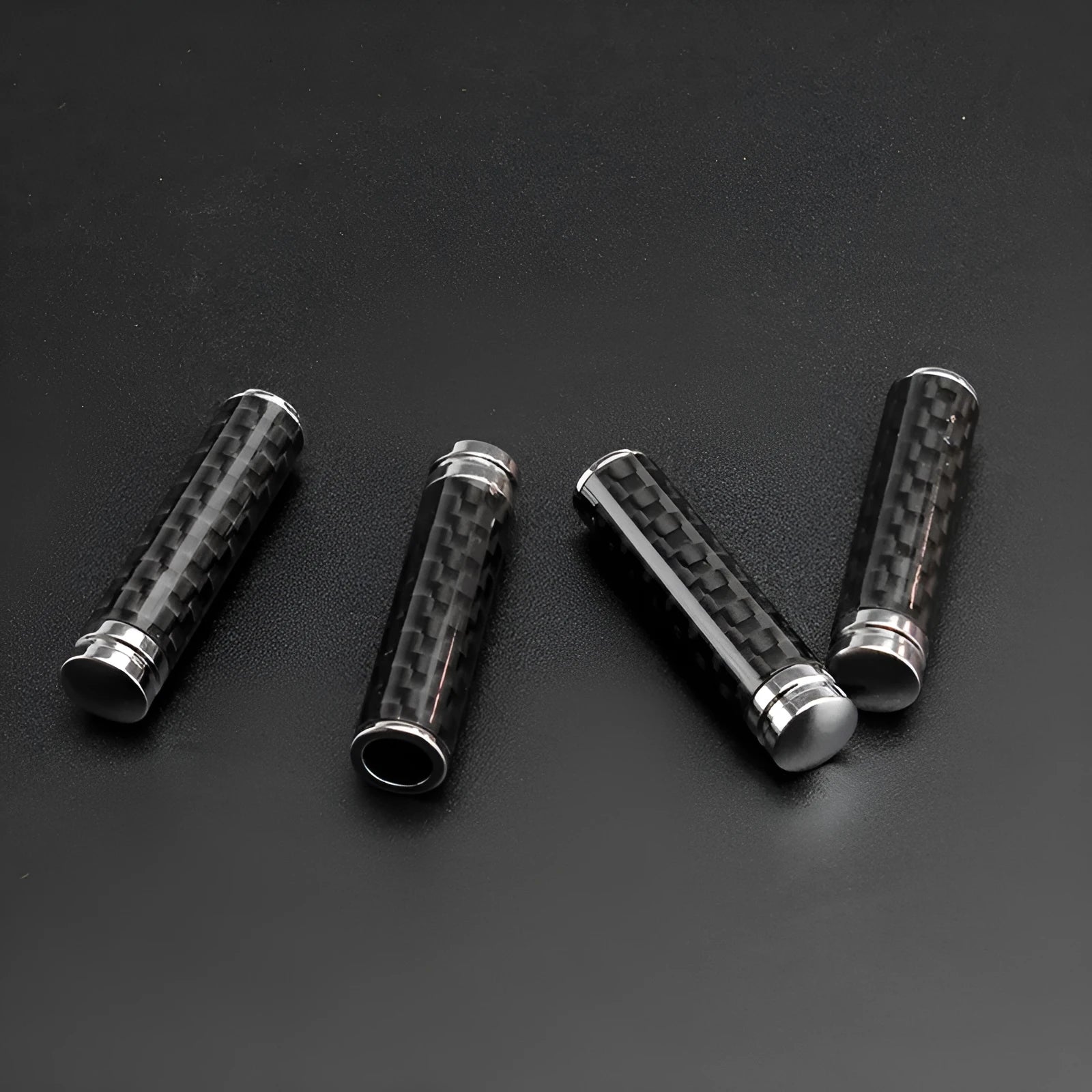 Four carbon fibre car door handle covers with metal components for direct replacement installation