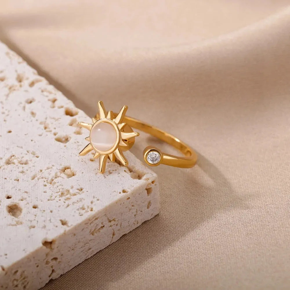 Simple geometric rotatable decompression ring with adjustable opening in gold electroplated finish