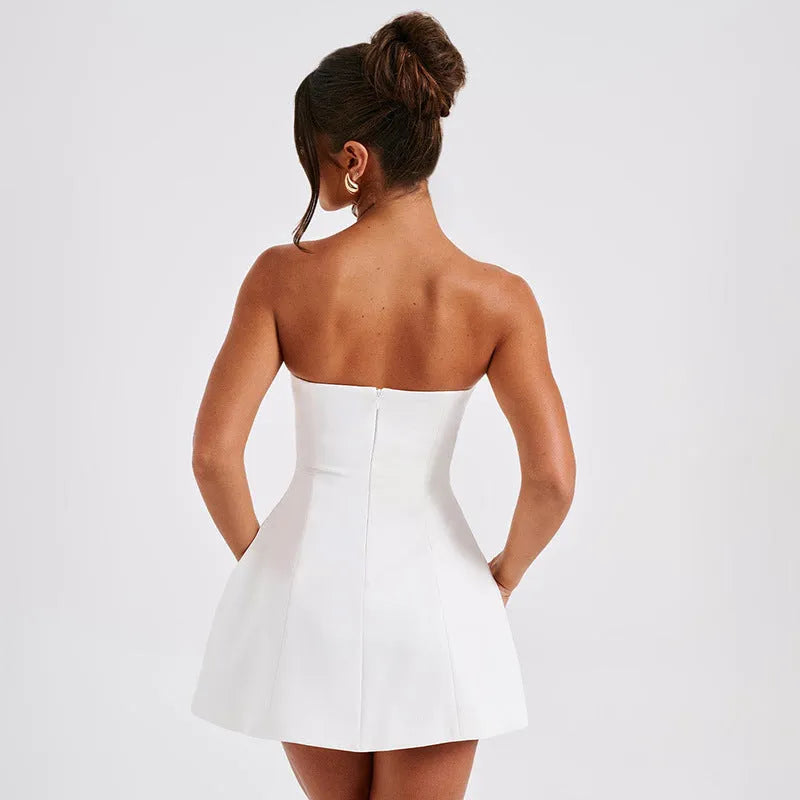 Women's solid colour backless tube dress with A-line short skirt on a hanger.