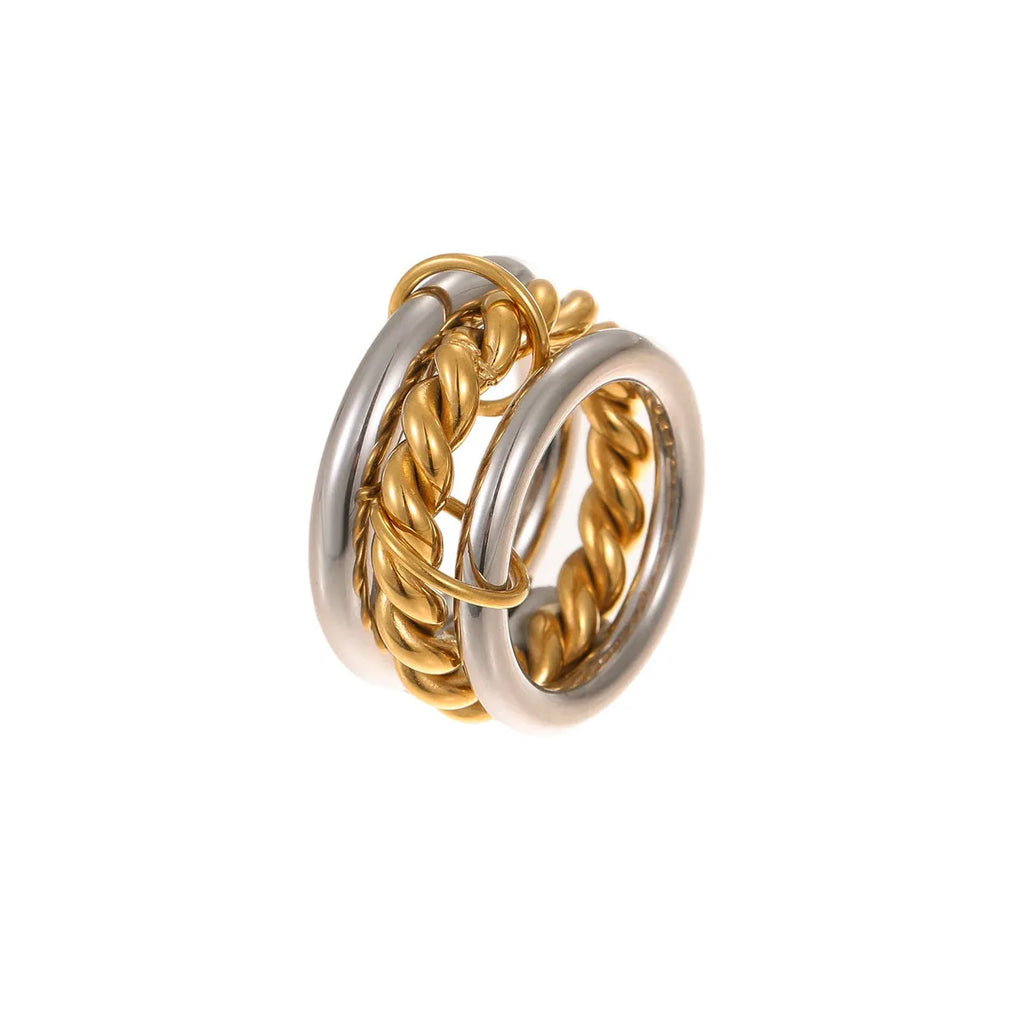 Stacked gold plated stainless steel rings with an exaggerated wide band design, shown in a free size.
