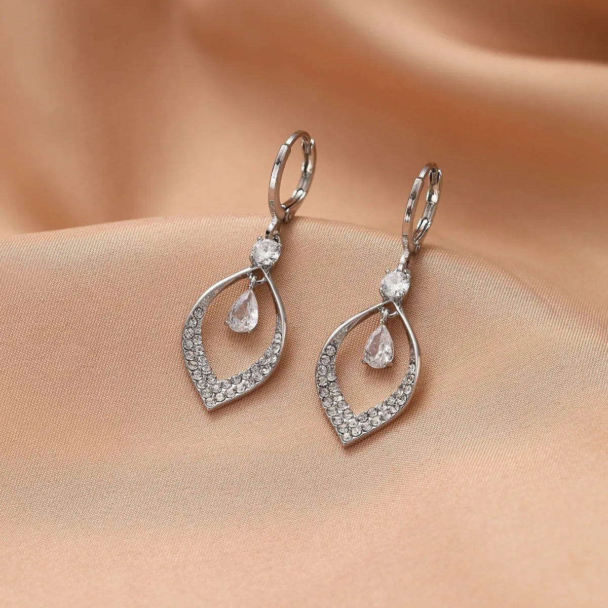 Gold and silver zircon water drop tassel earrings with copper electroplated construction
