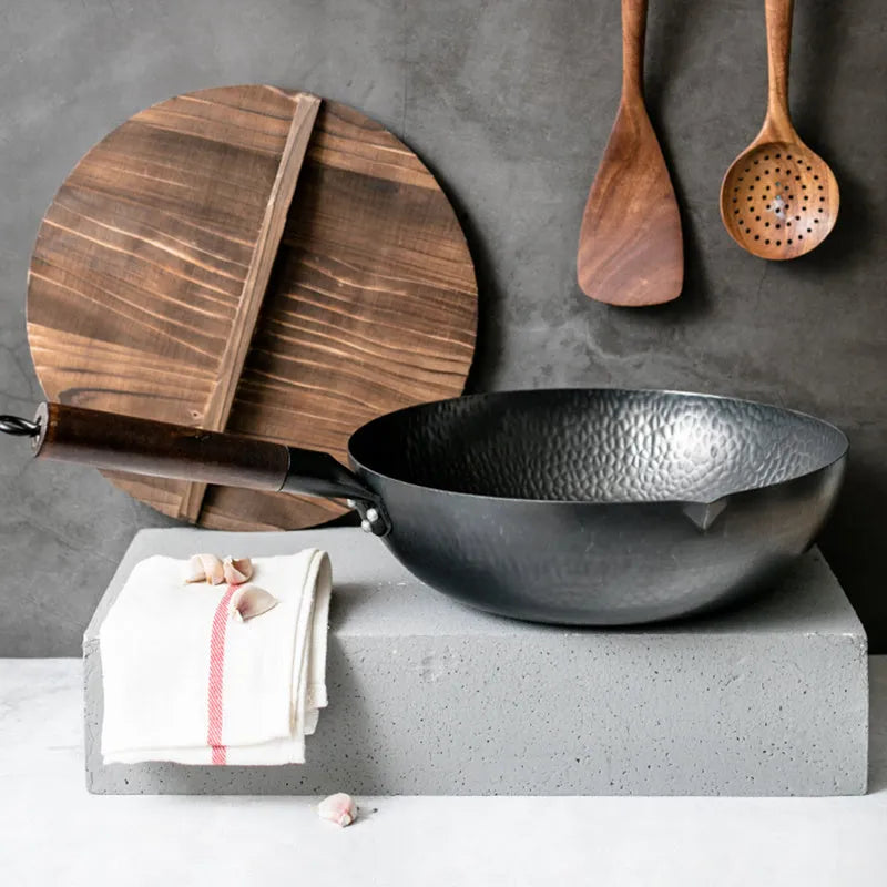 Traditional black iron wok with wooden handle, 32cm diameter