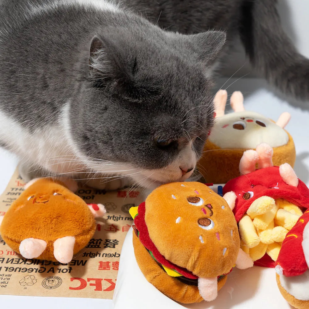Five soft chew toys for kittens shaped like hamburger, chicken leg, fries, bread, and hot dog