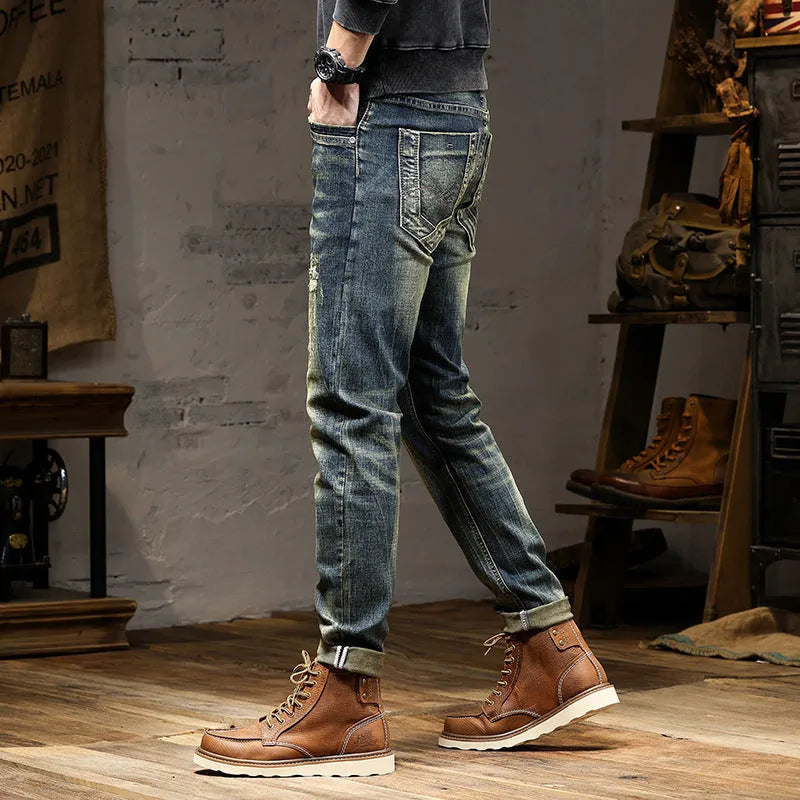 Man wearing retro blue stretch denim skinny jeans with a zip fly.