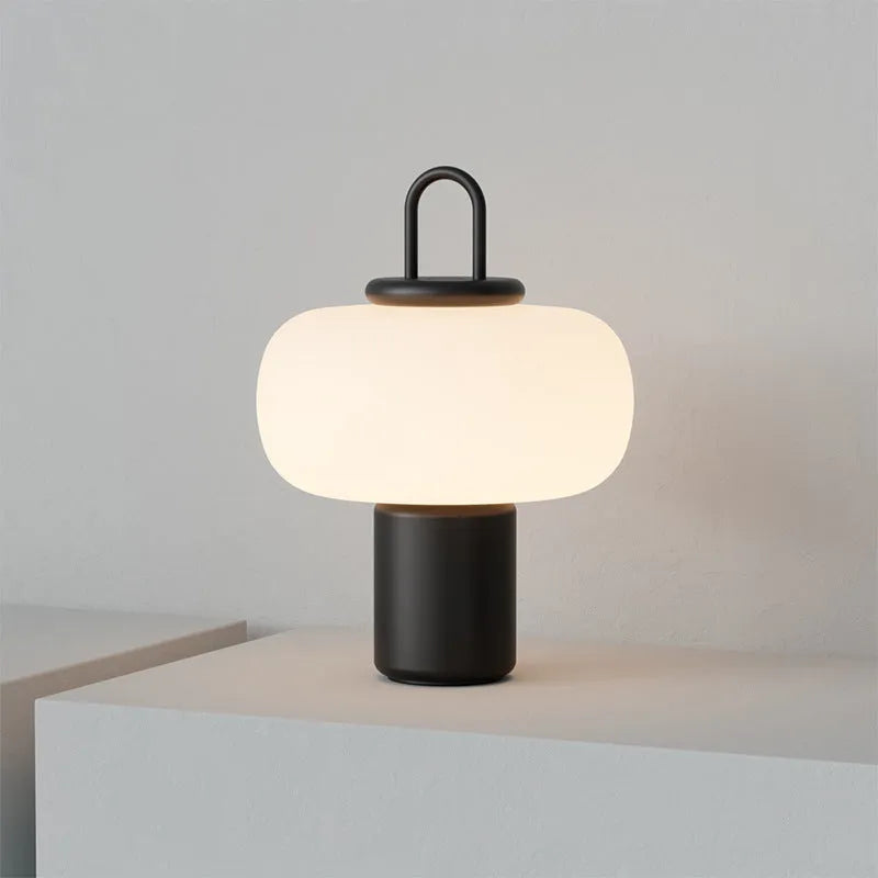Minimalist Japanese-style glass bedside table lamp for a child's creative bedroom.