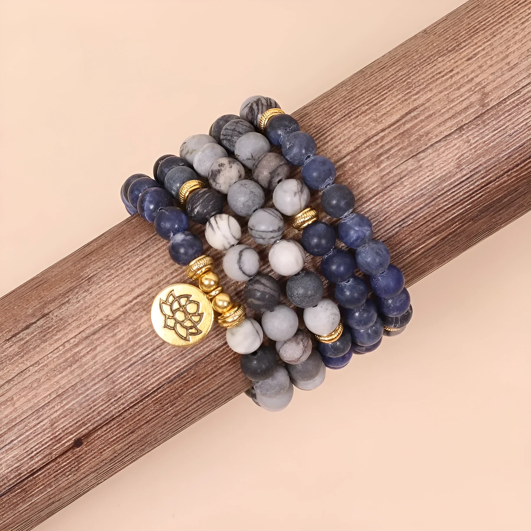 Blue multi-layer alloy bracelet with patterned network stone beads.