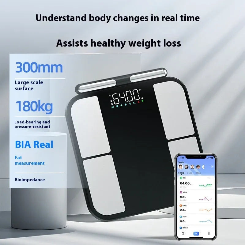 Black electronic bathroom scale with colour display on tempered glass platform for body composition analysis