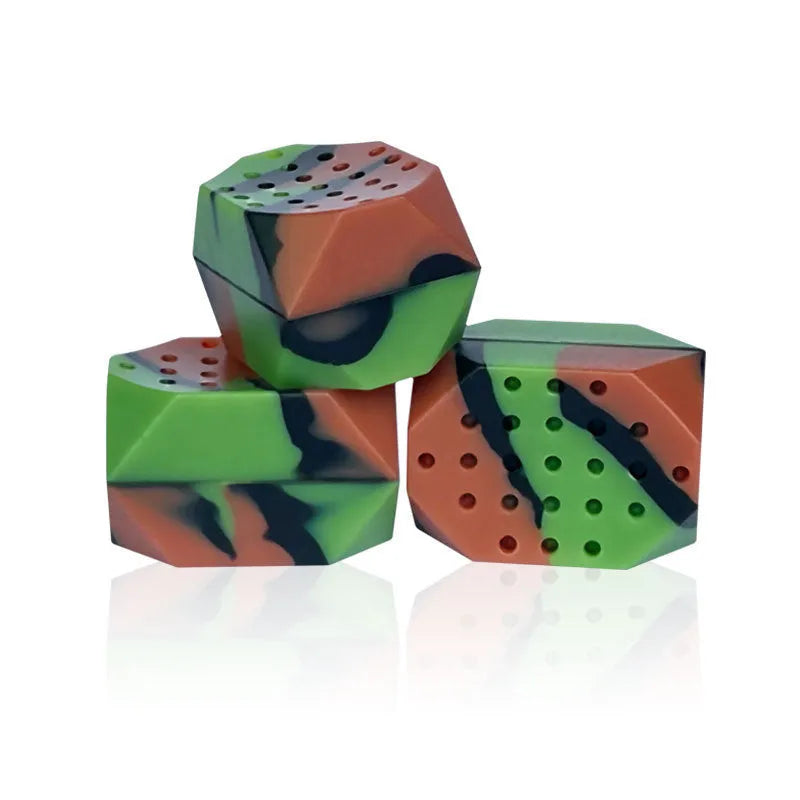 Two transparent silicone jaw exercise balls with camouflage patterns for masseter training