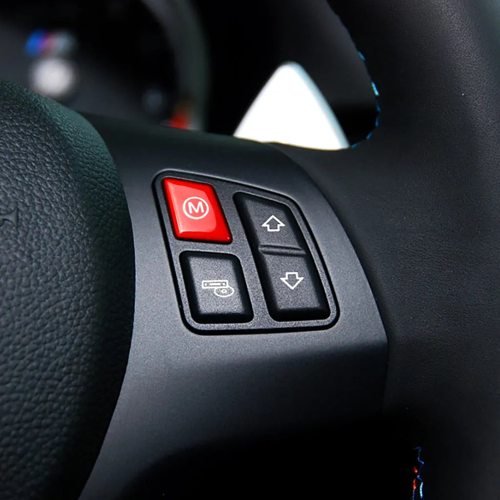 Pair of red and blue M1M2 steering wheel mode buttons for BMW F30 and F34 models with installation keys.