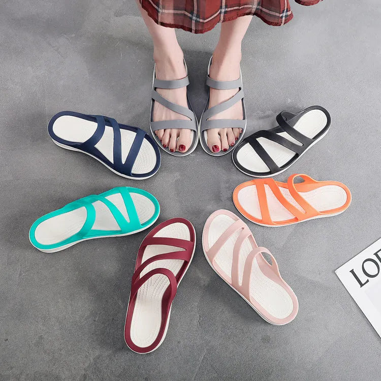 Women's solid colour casual beach sandals made from lightweight PP material, shown in red.