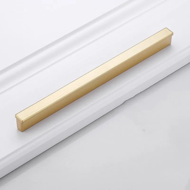 Gold T-shaped aluminium alloy single-hole cabinet door handle on a white background