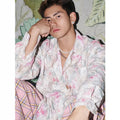 Blue floral long sleeve shirt with embossed pattern and loose fit