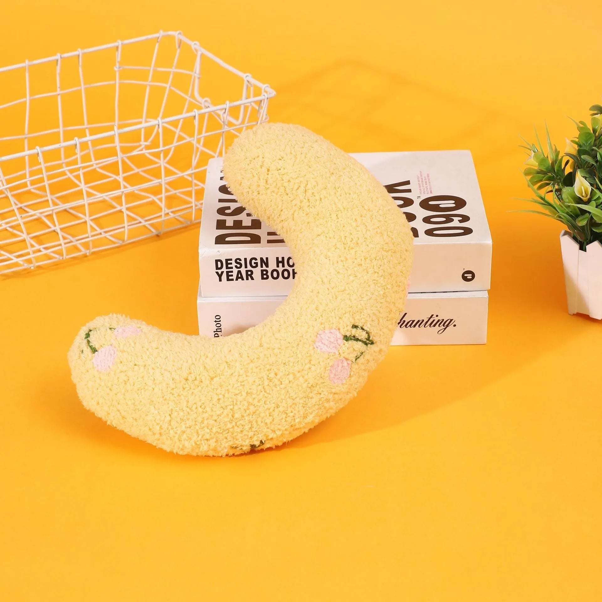 Half moon U-shaped cat pillow with cartoon designs in blue colour option