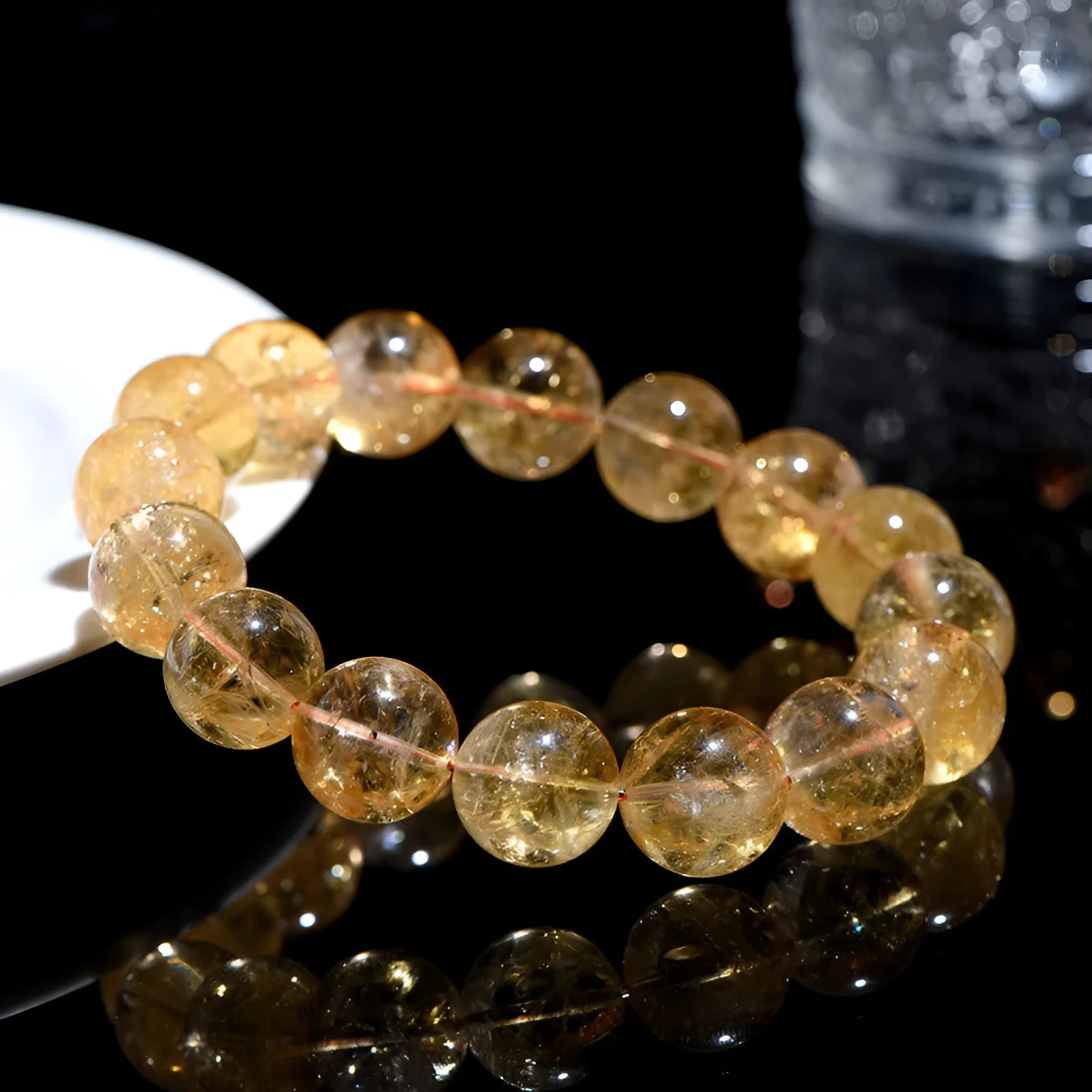 Natural yellow citrine bead bracelet showing geometric stone shapes in single circle and three circle configurations