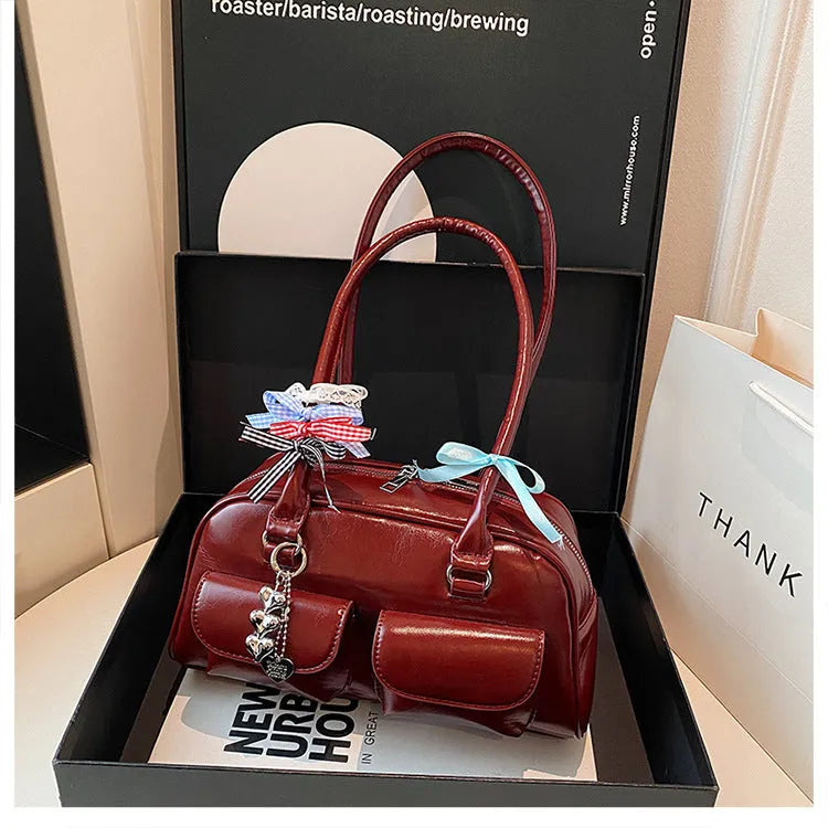 Retro pillow-shaped women's handbag in PU leather with double shoulder straps